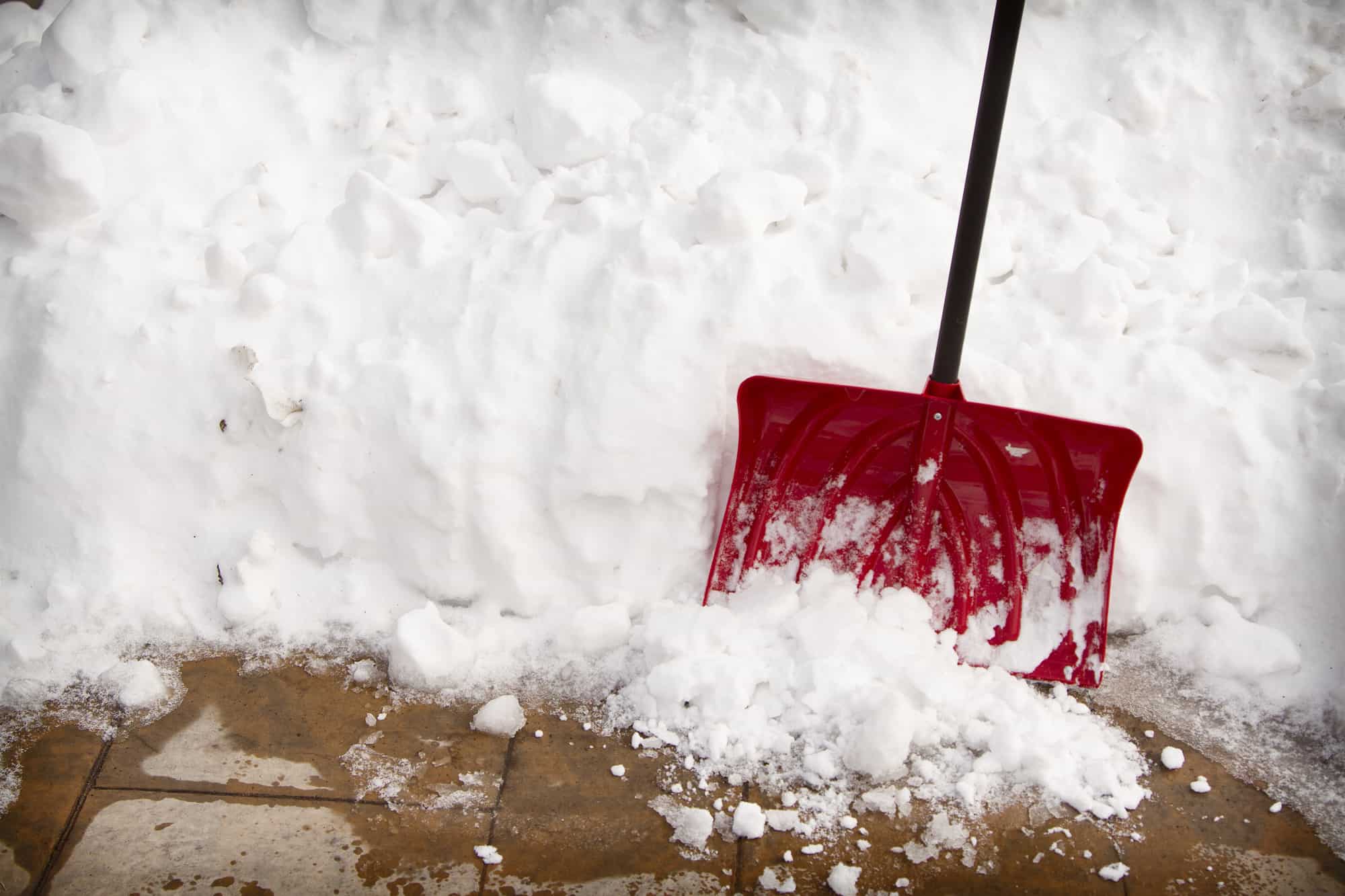 Snow shovel in a snow bank