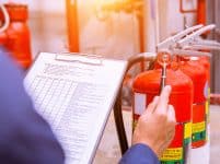 Engineer checking industrial fire control system,fire alarm controller, fire notifier, anti fire.system ready in the event of a fire.
