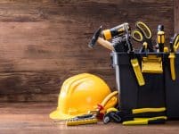 Safety helmet with tools in the black container