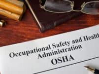 Occupational safety and health administration osha and a book.