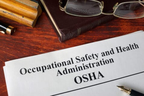 Occupational safety and health administration osha and a book.