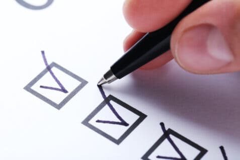 Check boxes on white paper