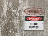 red, black and white Danger, Toxic Fumes warning sign