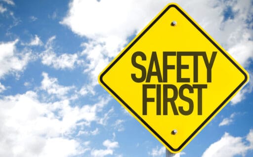 Safety First sign with sky background