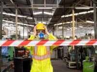 Chemical,specialist,wear,safety,uniform,and,gas,mask,raising,his