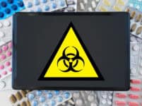 Medicine,,epidemic,and,healthcare,concept, ,boihazard,caution,sign,,tablet